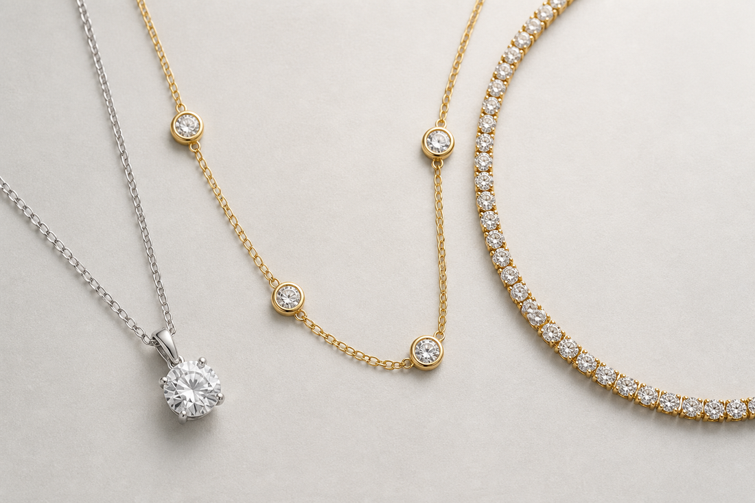 Three diamond necklaces for everyday wear: a solitaire pendant, a bezel-set necklace, and a light tennis necklace on a neutral background.