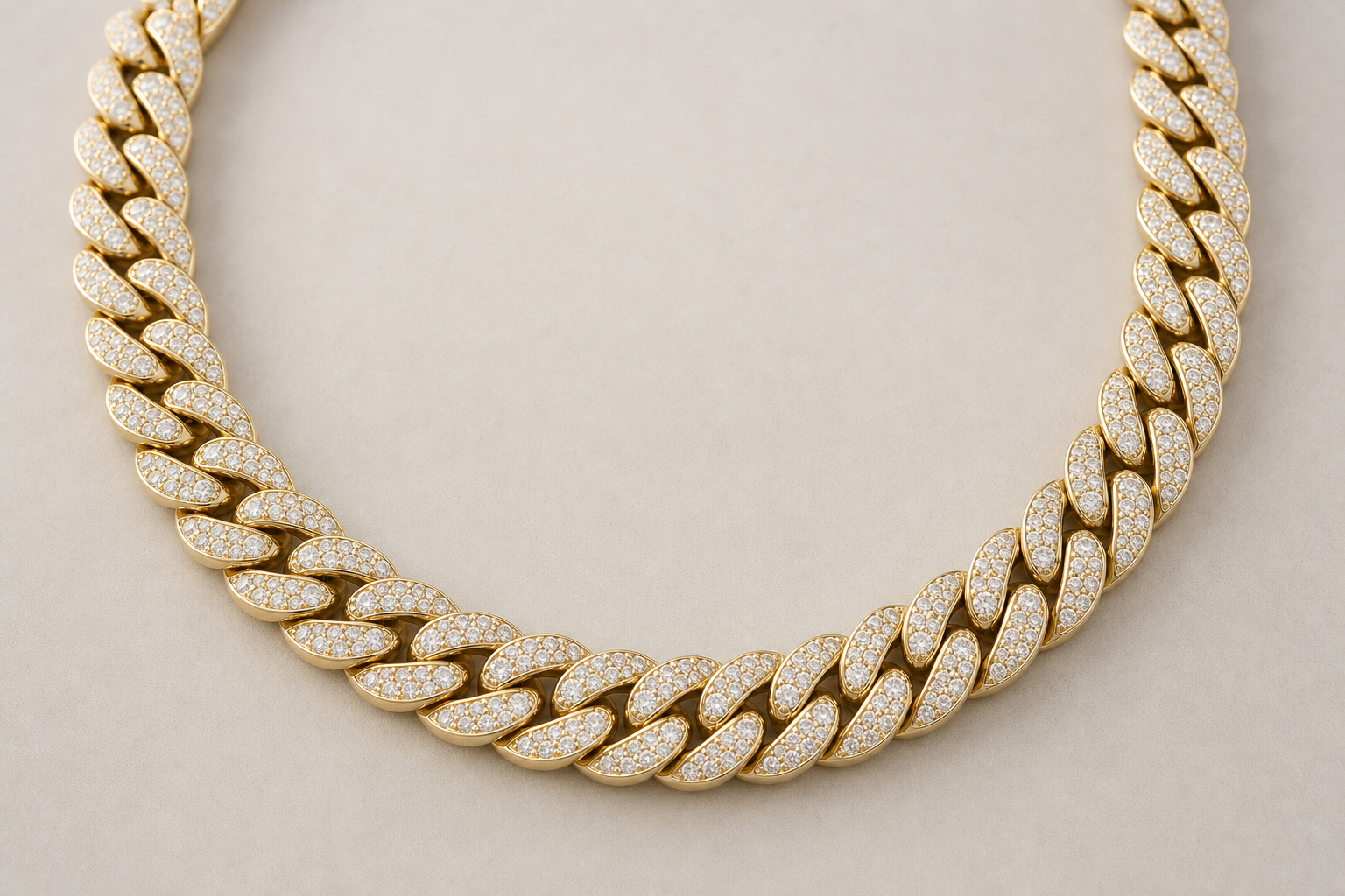 Diamond Cuban link chain with diamond-set interlocking links on a neutral background