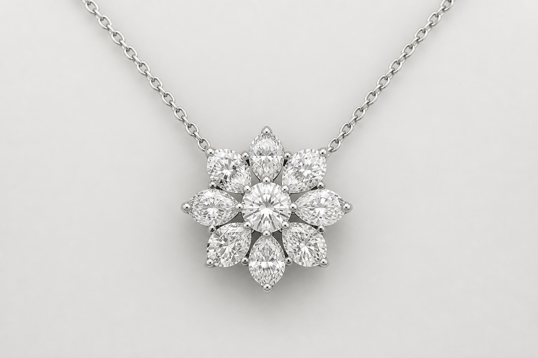 Diamond flower pendant necklace with a floral diamond cluster on a white gold chain against a neutral background