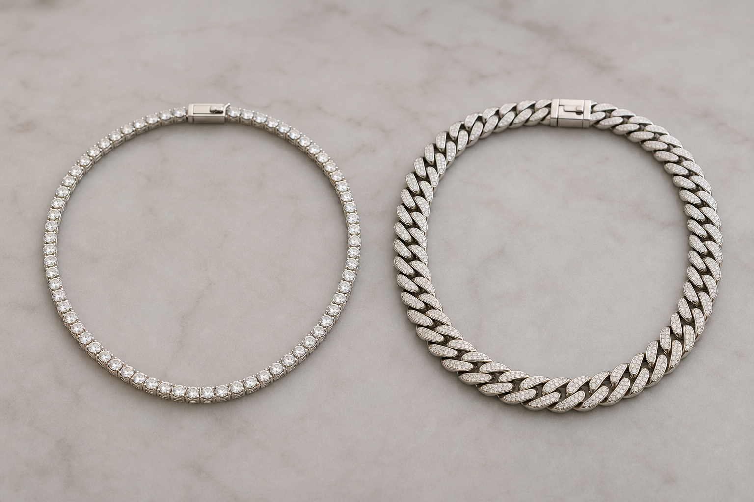 Diamond tennis necklace and Cuban link chain displayed side by side on a neutral surface