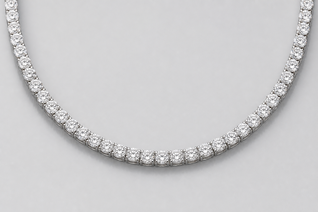 Platinum diamond tennis necklace on a light gray background