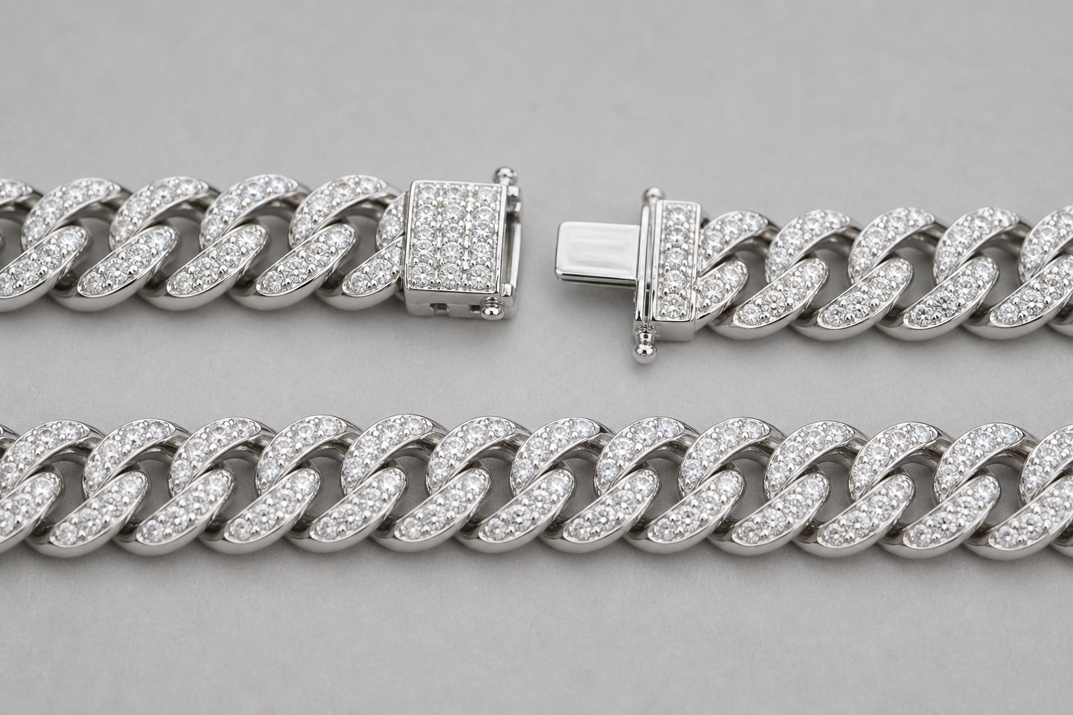 Close-up of a diamond Cuban link chain with interlocking links and hand-set stones