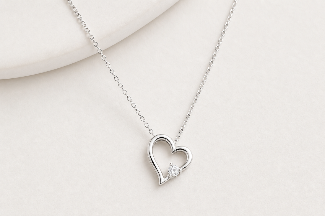 Women's sterling silver necklace on a light neutral background