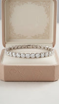 Diamond tennis bracelet in platinum with custom engraving La Maison Val D'or
