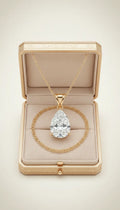 Pear-cut diamond pendant in regal gold La Maison Val D'or